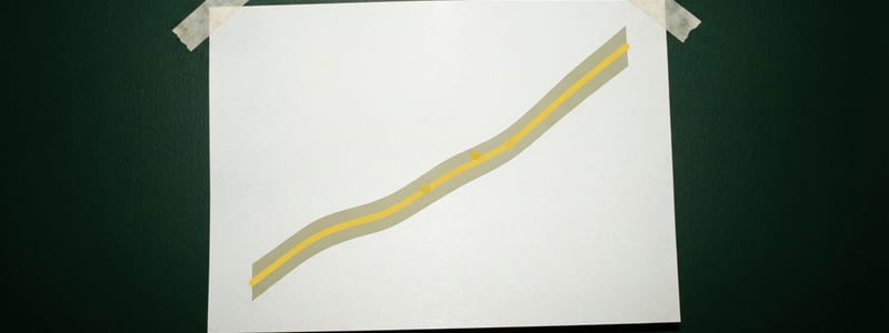 A printed forecast chart taped to a dark green wall.